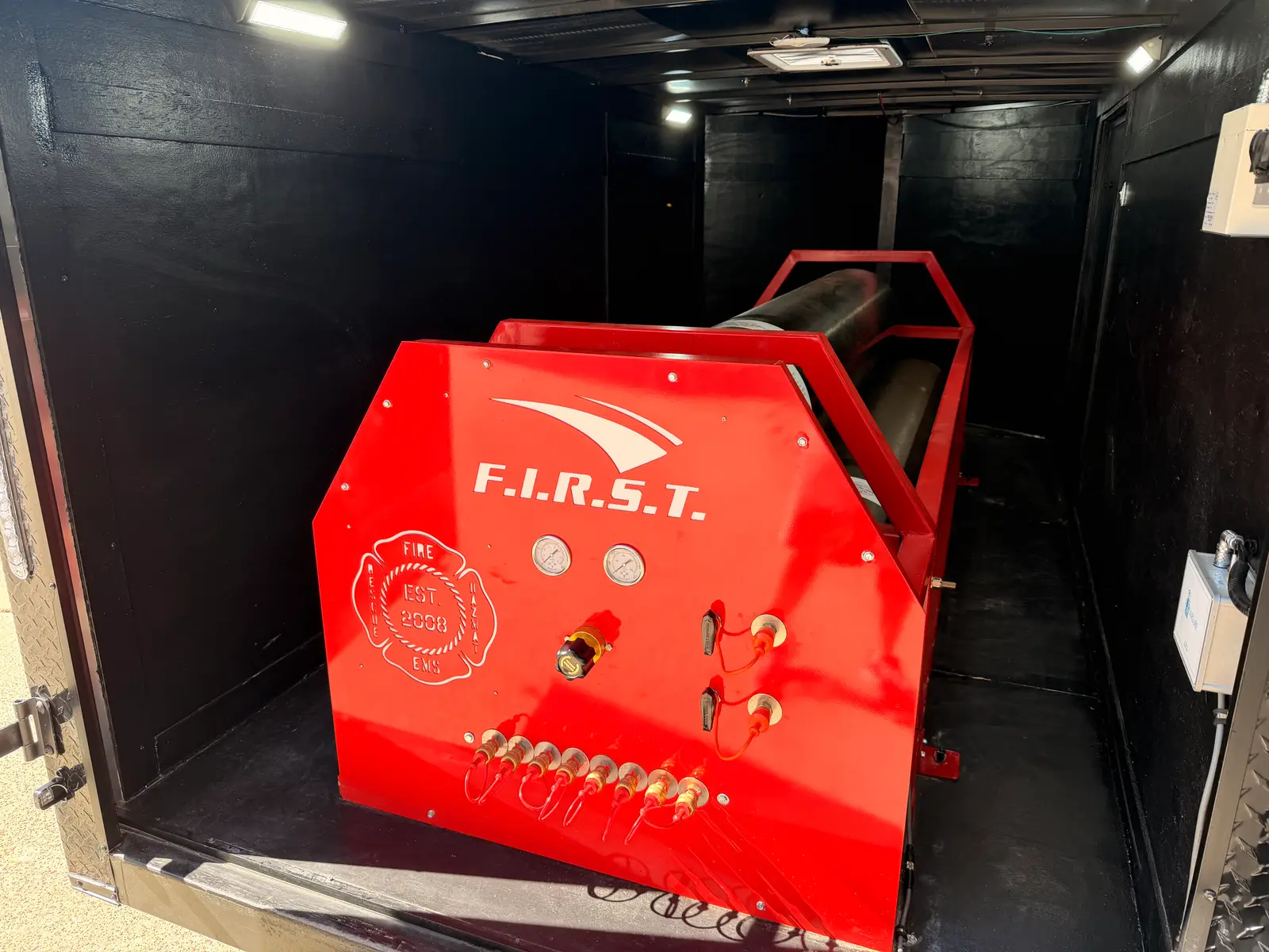 Interior of the BreatheFIRST breathing air trailer with carbon fiber cylinders